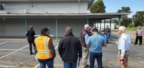 Group outdoors viewing bldgs