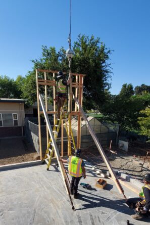 1st wall & supports w crane hook workers - best