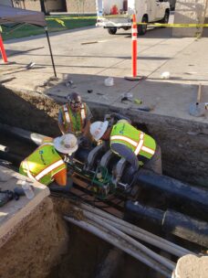 3 workers fusing HDPE chilled water pipe